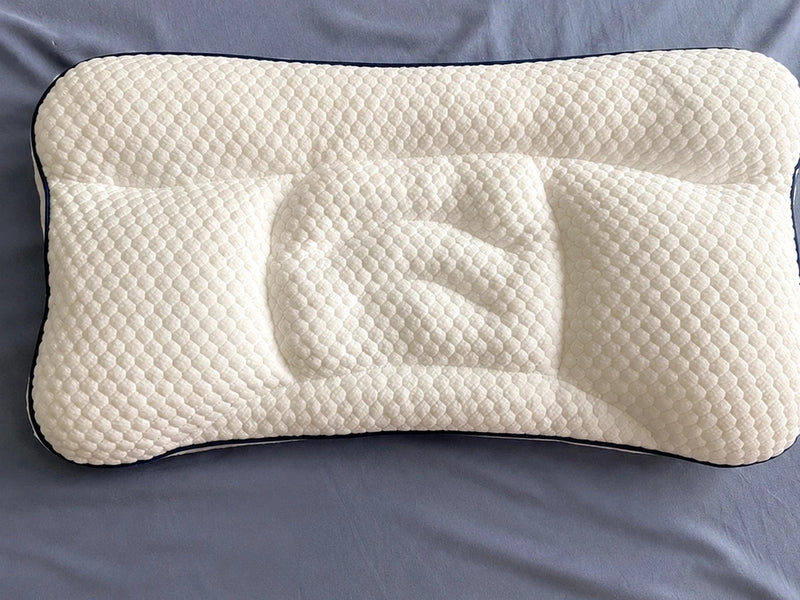 Foto de cliente: almohada Pioupiou vista desde arriba sobre ropa de cama azul grisácea
